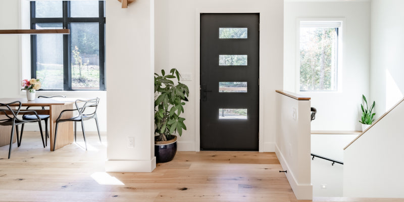 Contemporary home entrance with laminate floors