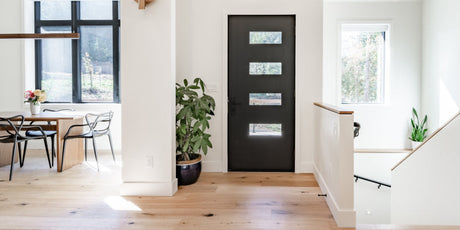 Contemporary home entrance with laminate floors