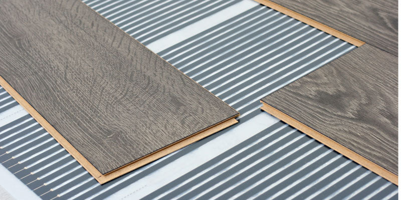 Radiant floor heating system under flooring