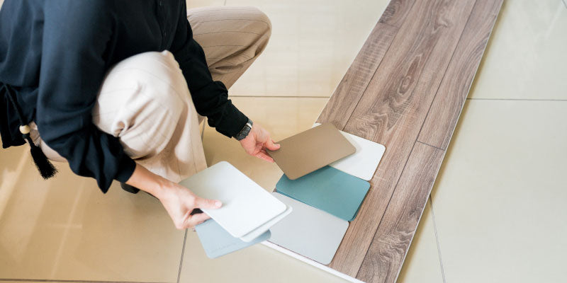 An image showing the contrast between tile and hardwood flooring choices
