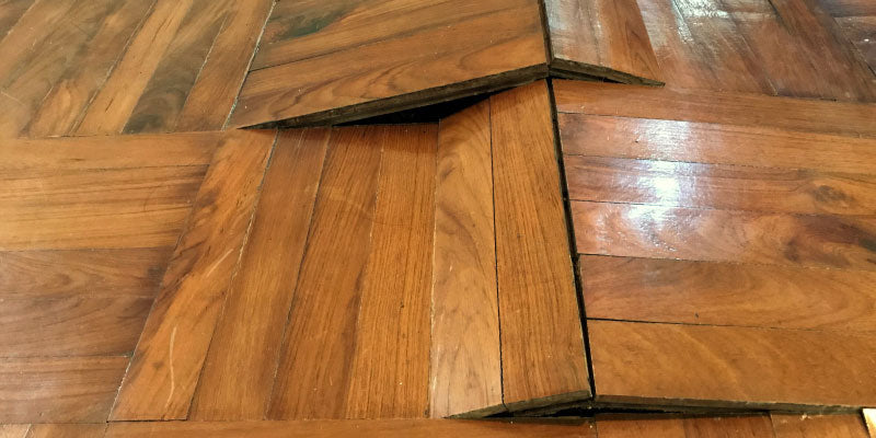 Buckled hardwood floor